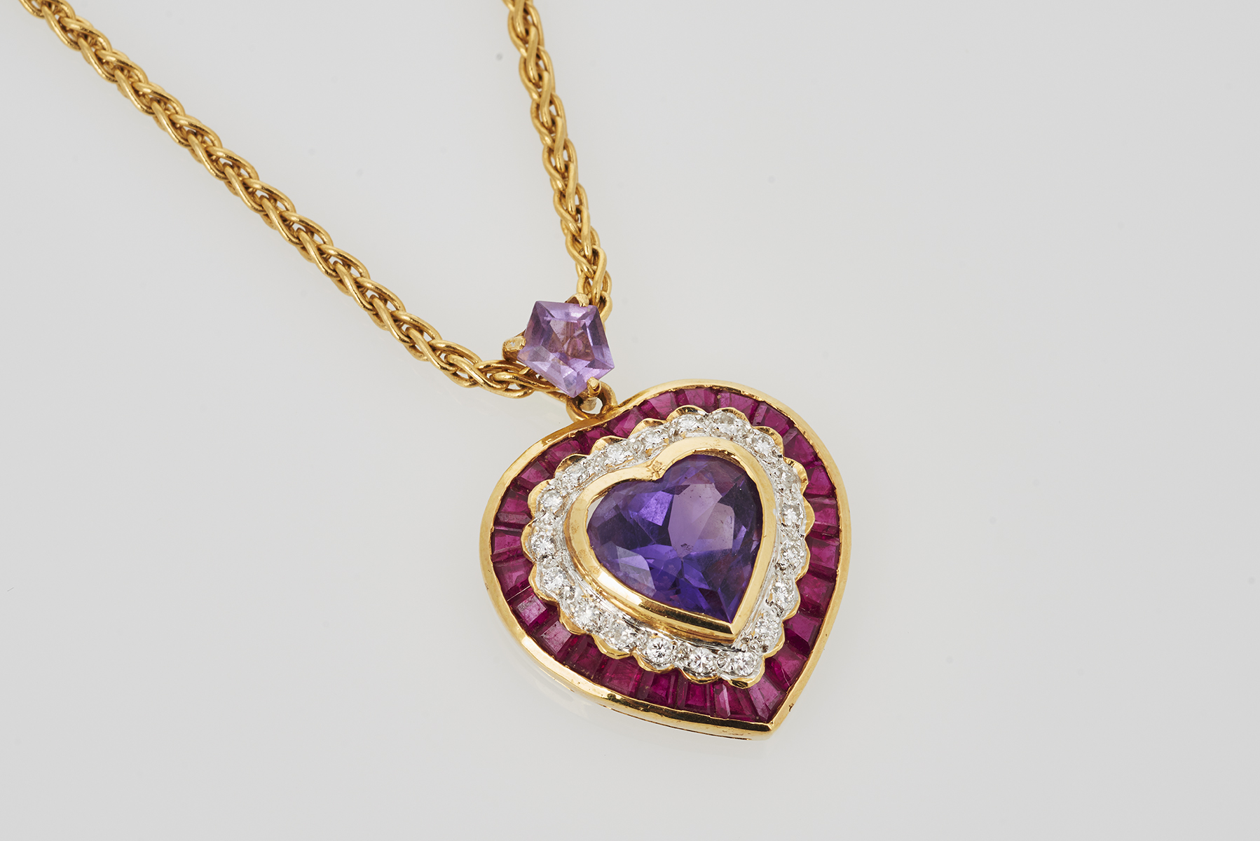 Amethyst, Ruby and Diamond Pendant - Shapiro Auctioneers