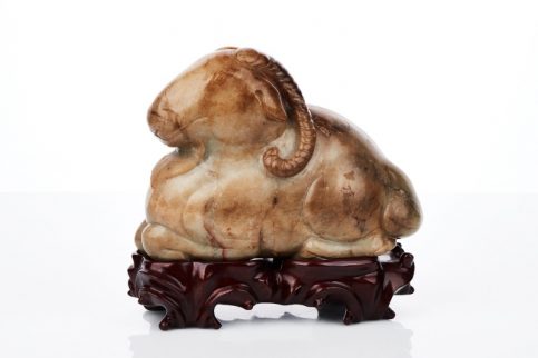 Chinese Carved Celadon and Russet Jade Figure of a Ram